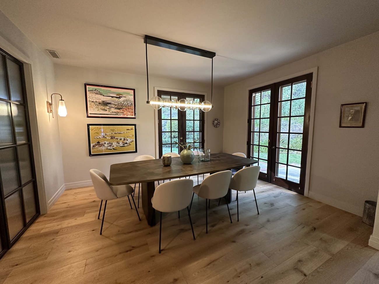 Modern dining room after remodel by Girl Flip Construction
